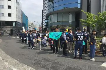 OBIC Seagulls football players showed their support in the parade line.
