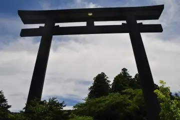 Behind the gate there is a large park-like area full of trees where visitors can rest