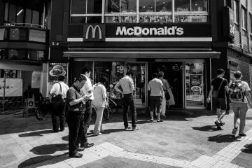 Customers wait in line for McDonald's near Shinjuku, a scene that is hard to believe for Americans.