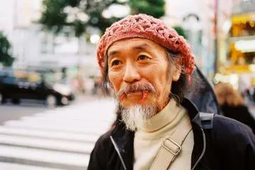 One day, I was running errands in Shibuya and ran into this gentleman crossing the streets. Before I managed to point my film camera at him, he could already sensed my excitement and stopped walking so I could take pictures of him. We exchanged some words with my broken Japanese, but not even once did I question him about the chilli-fangs. I didn't need to - it was just Tokyo being Tokyo. 