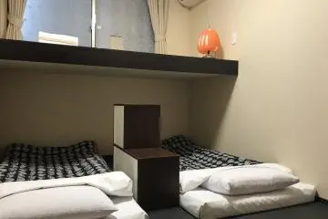Triple rooms with traditional tatami and futons