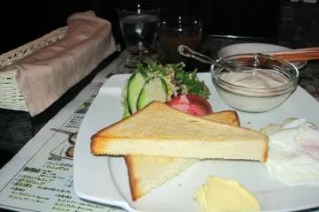 Featured here is the "Natural" breakfast with toast, mini salad, mashed potatoes and yogurt.