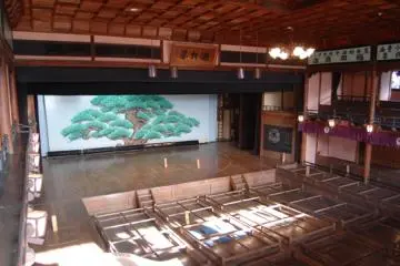 The interior with the traditional pine tree backdrop.