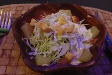<p>Salad is served in a wooden bowl and included with each meal</p>