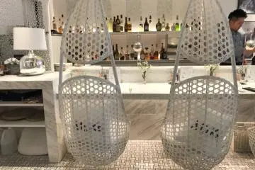 Comfy swinging chairs at the counter 