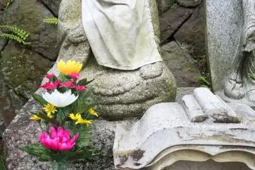 These Jizo statues are used as memorials for children who have passed away