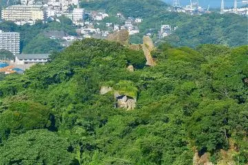 That's Tokyo Bay beyond the greenery, and notice the statue cut into the rock