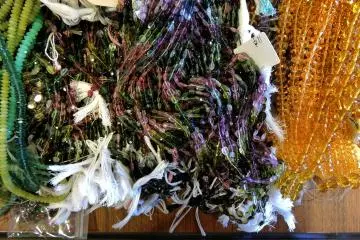 Strings of beads for sale in the store