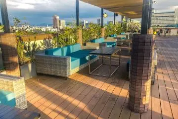 Enjoy a cocktail on the Azure blue lounges
