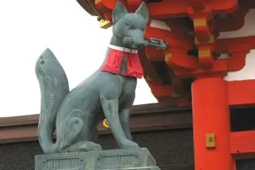 Kitsune holding a rice storage key