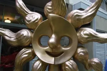 The iconic sun face in the garden