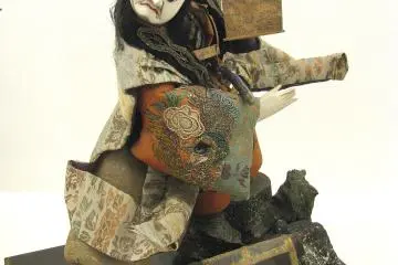 Samurai doll with a kabuki face