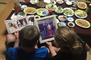 Looking through a family photo album and listening to family stories can be a good ice breaker.