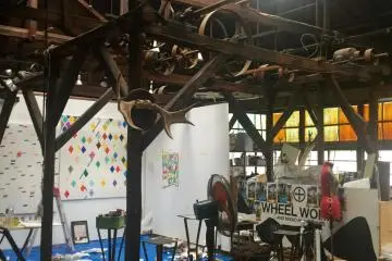 Look up and check out the old machinery hanging from the beams.