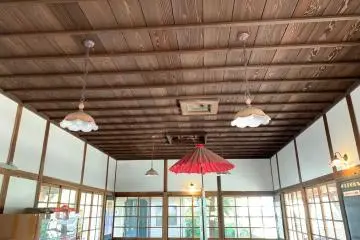 The ceiling of the station still has the original panelling, with the vent for the kerosene stovepipe