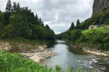 It sits right by a river, offering serenity and lovely views