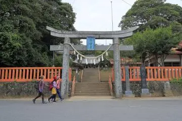 By a Shinto shrine