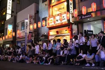 The public filled both sides of the street