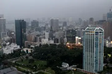 The Rainbow Bridge in Odaiba is visible