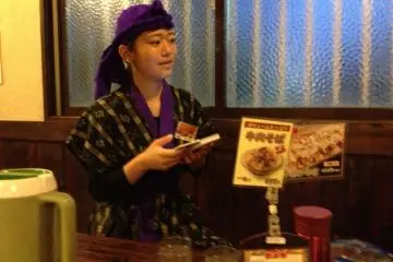 <p>The friendly wait staff won't dance for you but nevertheless are dressed in authentic eisa constumes</p>