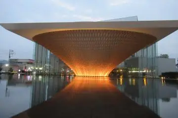 The reflection recalls Mt. Fuji