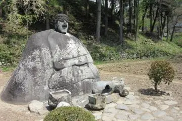 Stone Buddha bringing good fortune