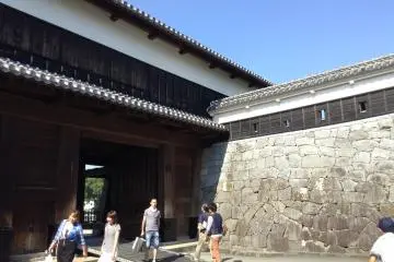 Walk through the Nishi-Ote Gate to pass through one set of outer walls.