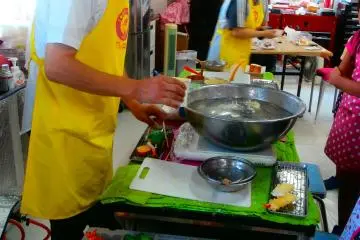 The jolly staff demonstrating how to make wax replicas