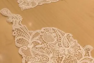 One small corner of a lace handkerchief...