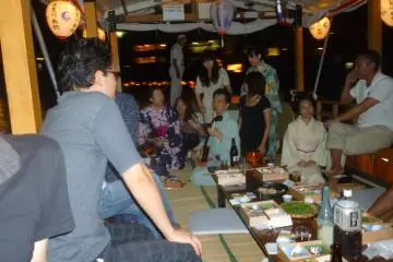Food, song and cormorant fishing. Enjoying the cruise.
