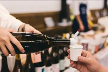 Just a sip of the fresh-made sake