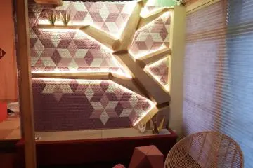 The sitting bench is springtime in origami.