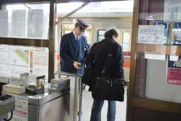 Guard checking tickets