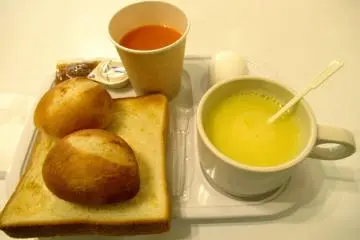 Corn soup, toast, buns and juice for breakfast