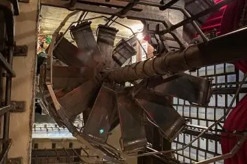 The spiral staircase is part of the steampunk decor