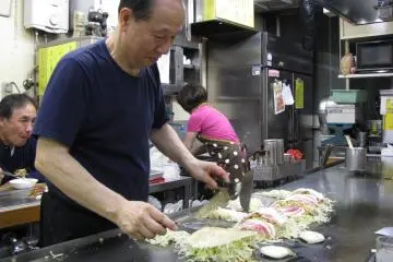 The cooking process of okonomiyaki