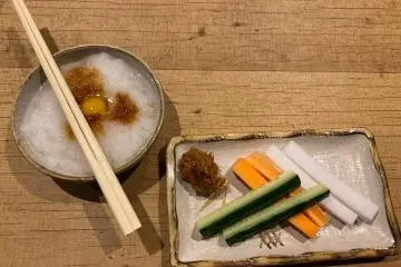 Appetizers include raw vegetables with miso dip and a 'daikon', (white radish) dipping sauce for yakitori