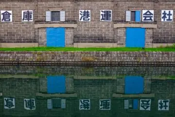 Great warehouse reflections off the silky smooth canal water