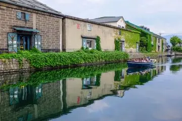 Tourists enjoying a boat cruise along the canal