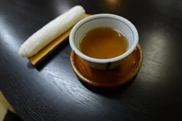 When you enter the restaurant, they give you green tea and a wet cloth