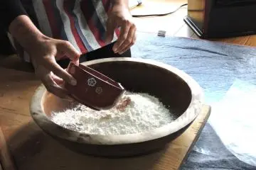 Adding water to flour