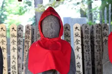 Jizo in a red hood