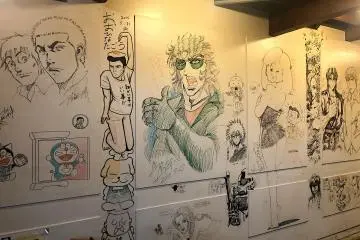 Drawing by Shinji Hiramatsu (middle)