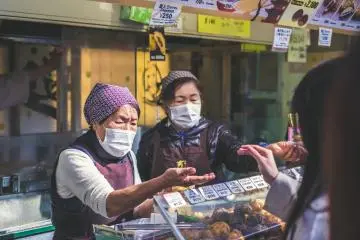 Food handlers often wear masks as a courtesy