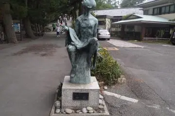 A statue of the fisherman who picked up the Celestial Maiden's kimono
