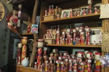 A collection of kokeshi dolls