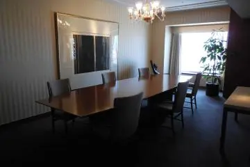 The Imperial Suite room has a dining table