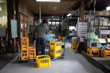 Preparing sake to be sold in the shops