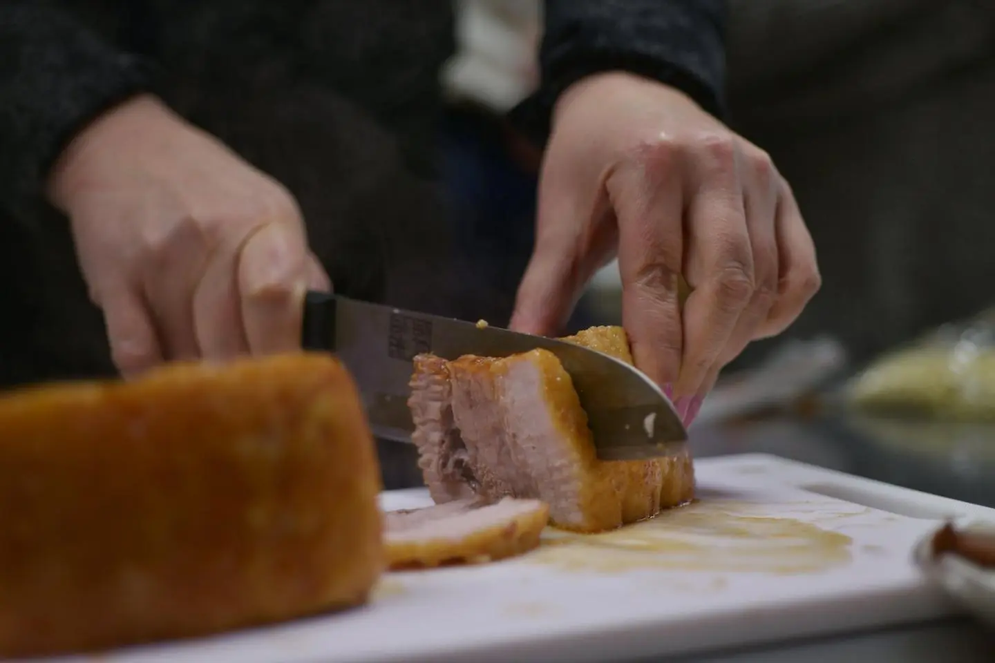 Cutting the Chashu pork (Photo: Mark Oxley)