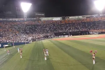 Cheerleaders lead the celebration after a win